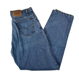 Vintage Levis 560 Jeans Mens 35x34 Medium Wash Blue Loose Tapered Denim 90s